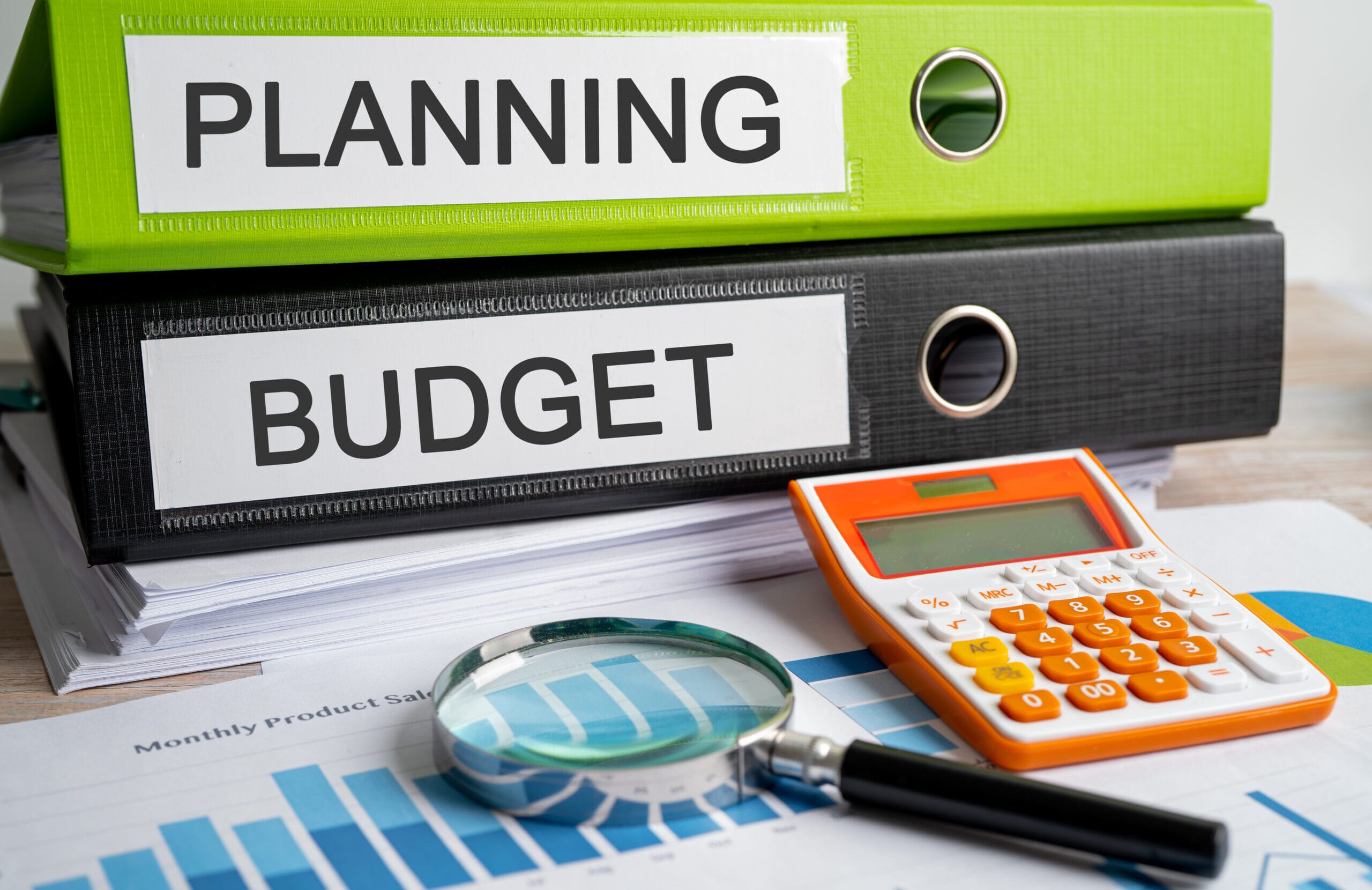 Planning budget. Binder data finance report business with graph analysis in office.